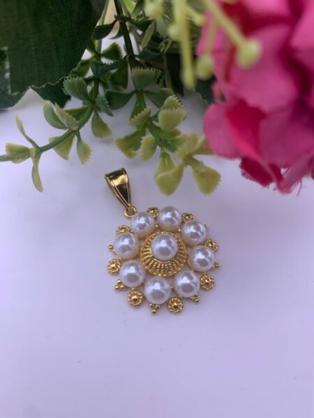 Dije de perla